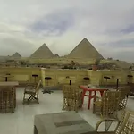 Zeina Pyramids View